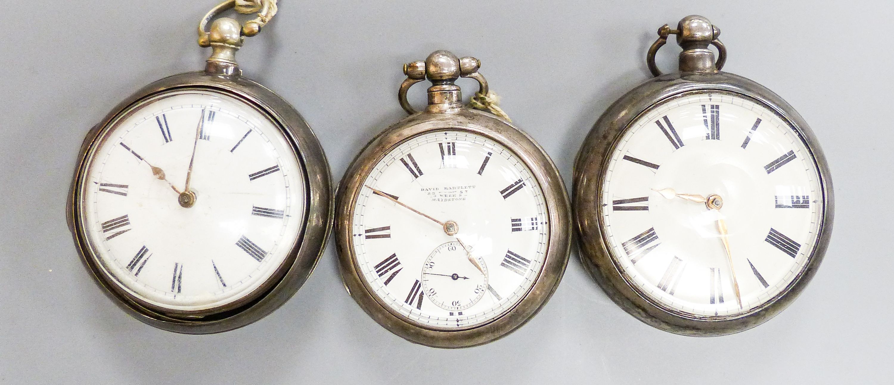 Three 18th/19th century silver pair cased keywind verge pocket watches, including Newland, London.